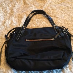 Black nylon Dooney and Bourne bag .